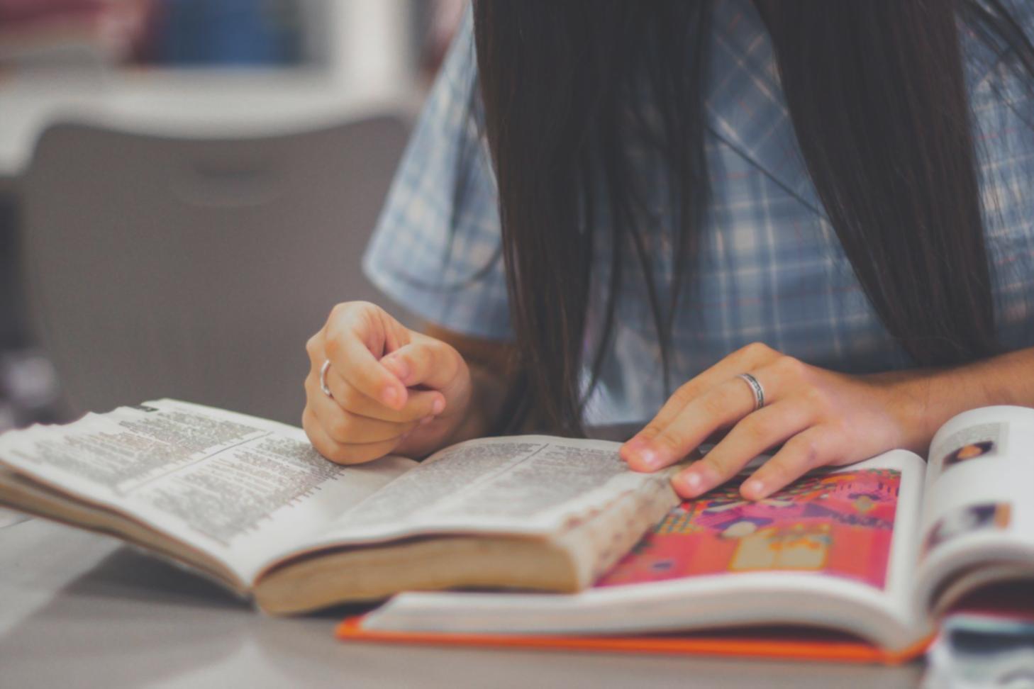 Professional trader analyzing long-term market trends on computer screens